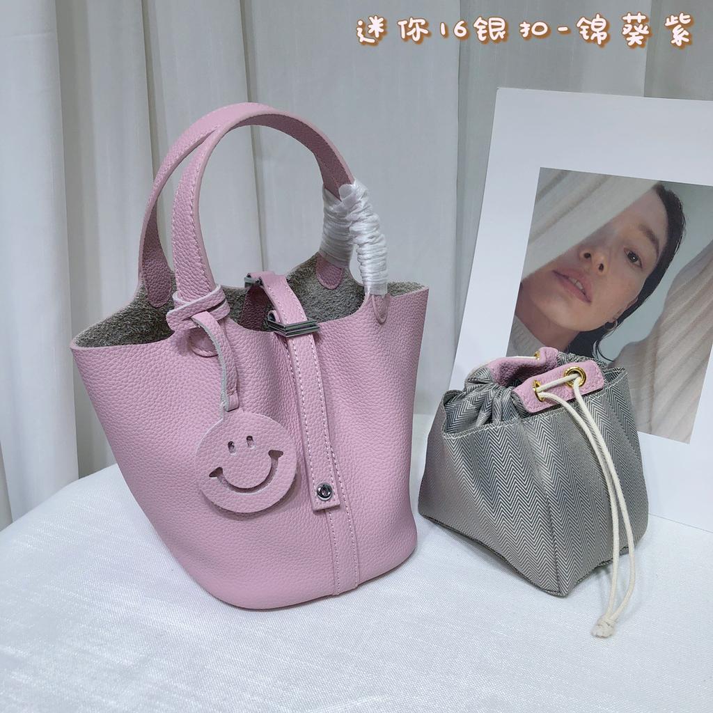 Spot wholesale top layer cowhide vegetable basket bag leather bucket bag commuter fashion lock buckle hand-held handbag woman