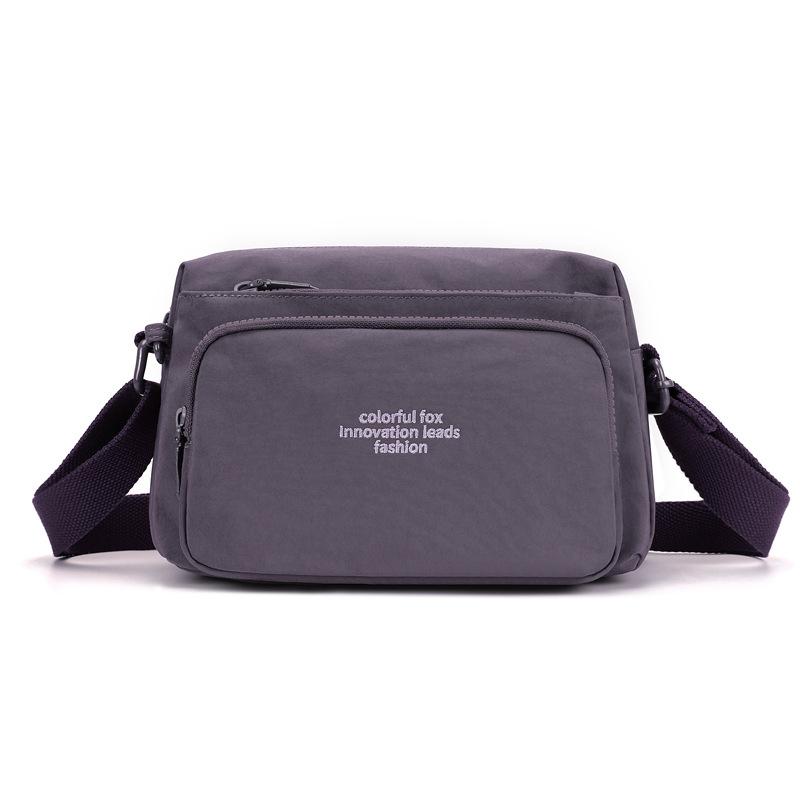 New Women's Versatile Multi-layer Nylon Leisure Commuter Travel Portable Messenger Bag