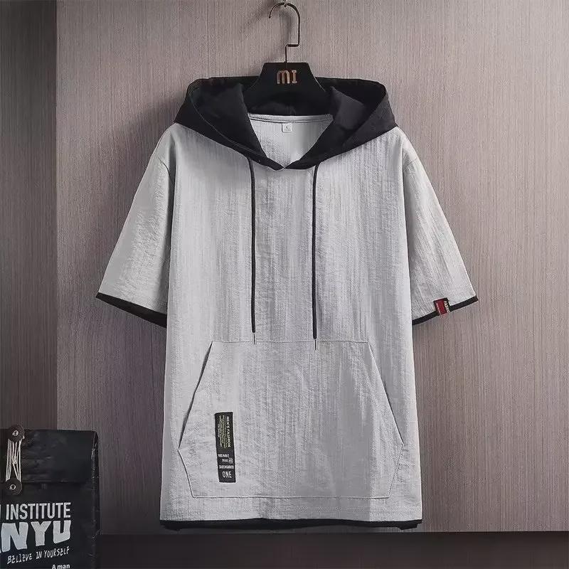 Pánské oversized tričko s kapucí v hongkongském stylu – módní trend léta 2024