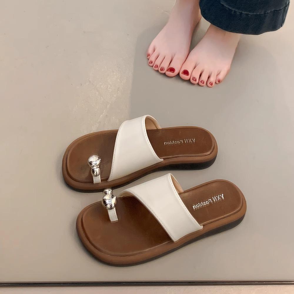 

Дизайнерські нішеві чорні пляжні круті шльопанці жіночі для вулиці 2025 літо нові плоскі шльопанці 40