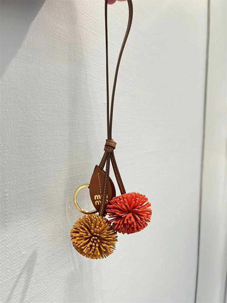 

Cowhide Colorblock Leather Charm: Small Lychee Bag Accessory