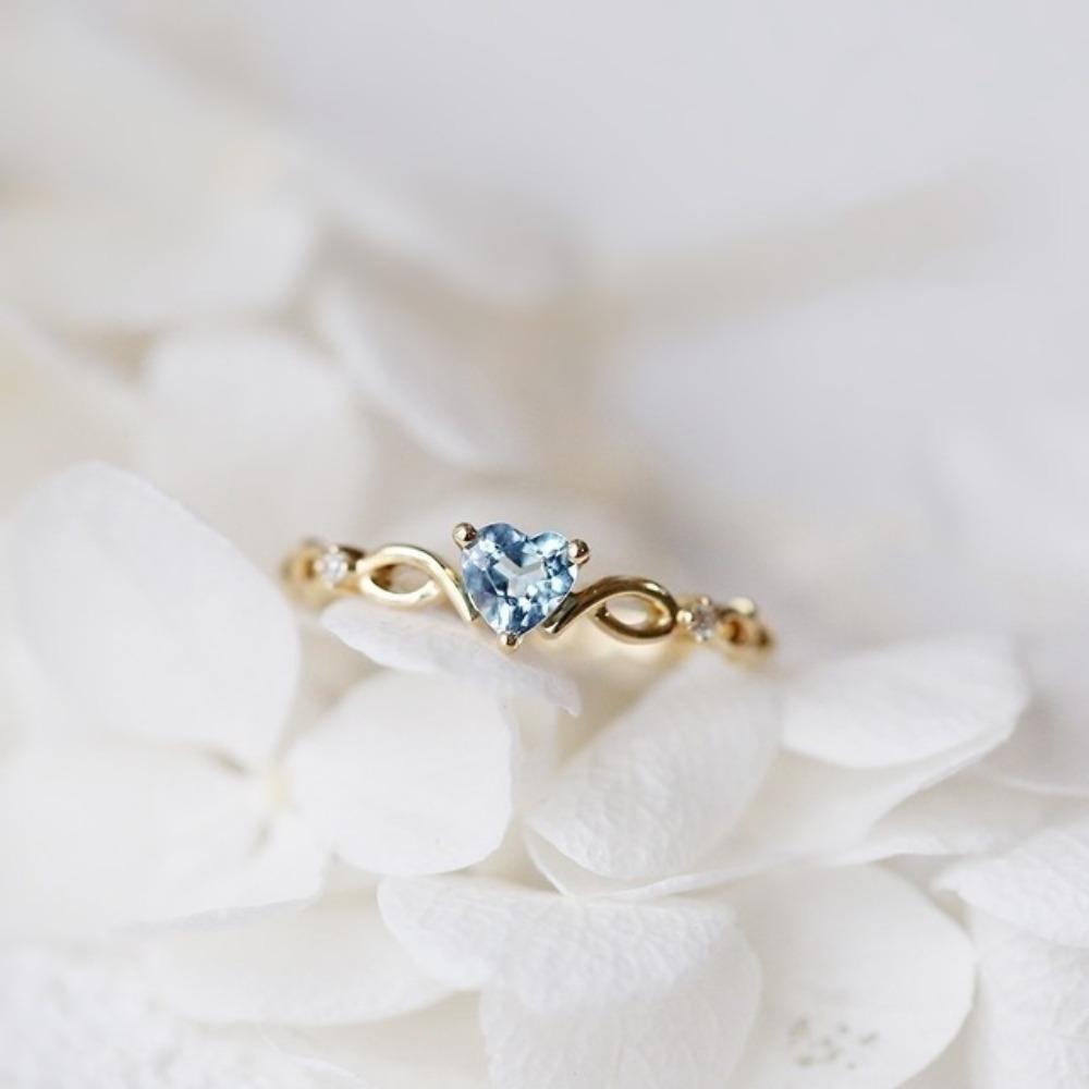 Elegant Heart Shaped Ring for Women with Blue Topaz Gemstone Simple and Fresh Engagement Ring no. 5