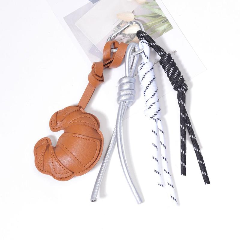 

Yogodlns Diy Braided Rope Faux Leather Croissant Bag Pendant Trinket Multi-Functional Backpack Pendant one size коричневый