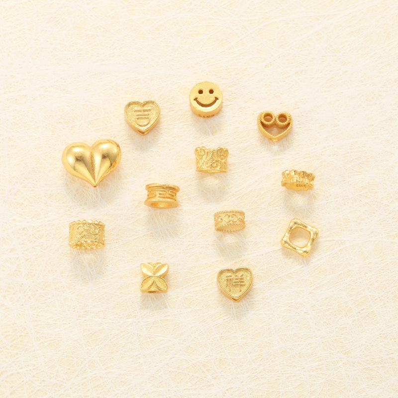S925 Gold-Plated Silver Hollow Heart Smiley Face Bead Spacer for DIY Bracelet Accessories.