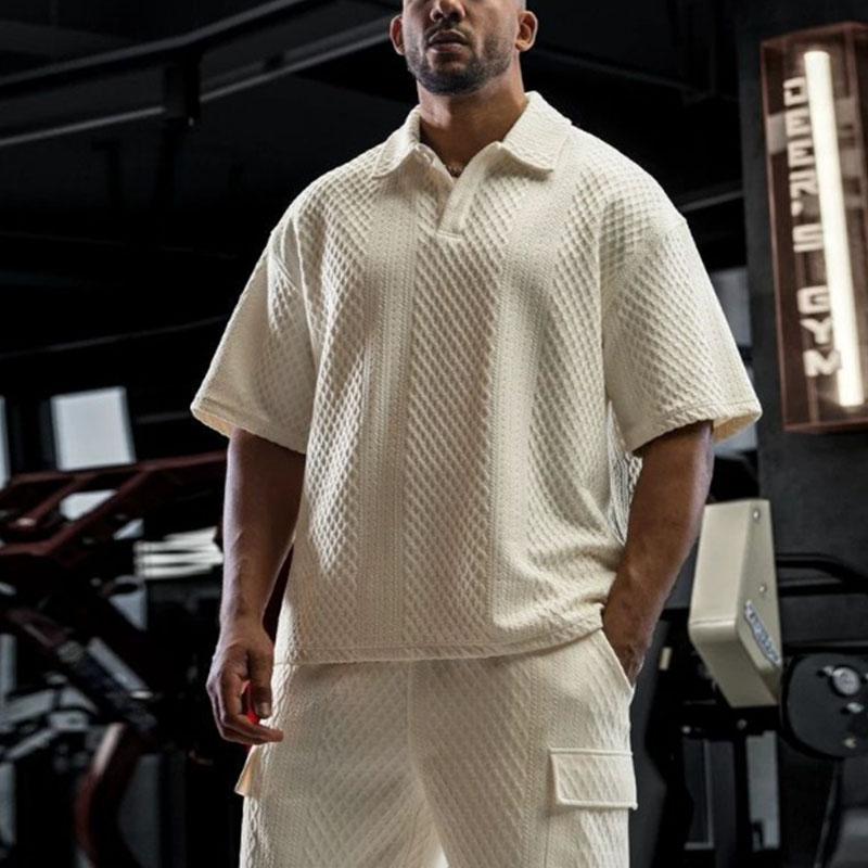 

Мужская стеганая футболка-поло оверсайз кремового цвета с коротким рукавом, воротником на пуговицах, повседневная, свободного кроя, с текстурной вязкой L бежевый