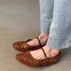 Sheepskin French hollow woven flat-soled sandals women's summer outer wear woven belt light mouth pig cage shoes Mary Jane single shoes