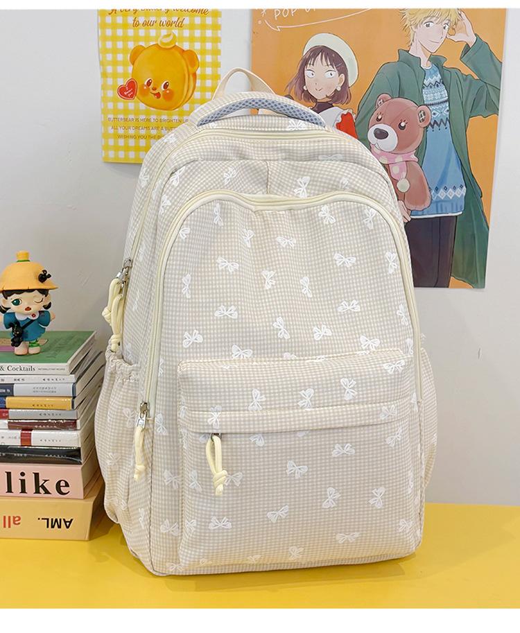 Schoolbag1011 New Plaid Printed Bow for Junior High School Girls, Versatile Large-capacity Lightweight Campus Solid-color Backpack