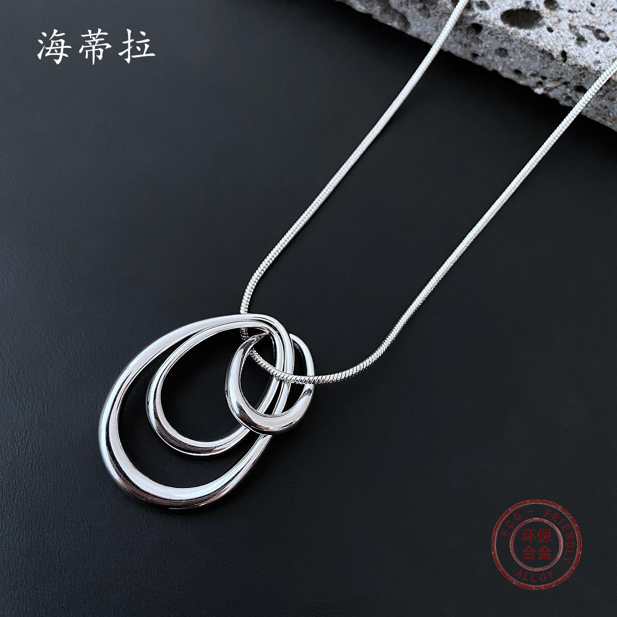 

Irregular ring stacked alloy pendant, simple and high-end men s and women s versatile water drop ring necklace