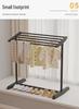 Versatile Foldable Clothes and Towel Drying Rack with Storage Shelf for Balcony or Floor Use