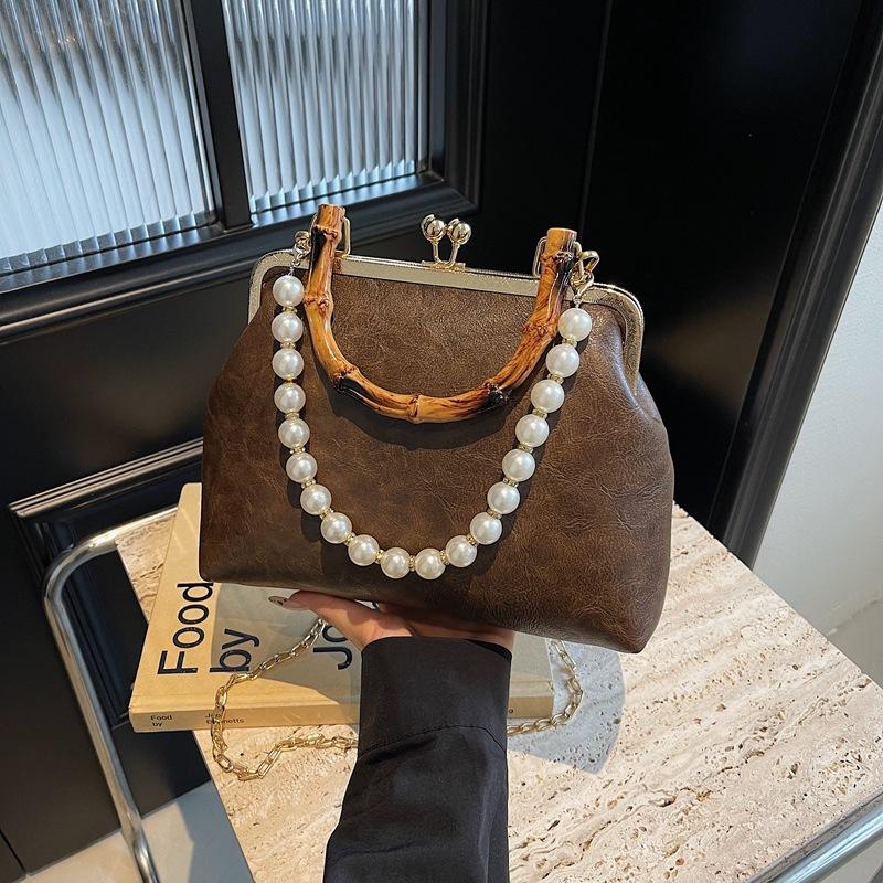 Spring and summer retro small bag women's new fashion bamboo joint portable mouth gold bag pearl chain messenger bag