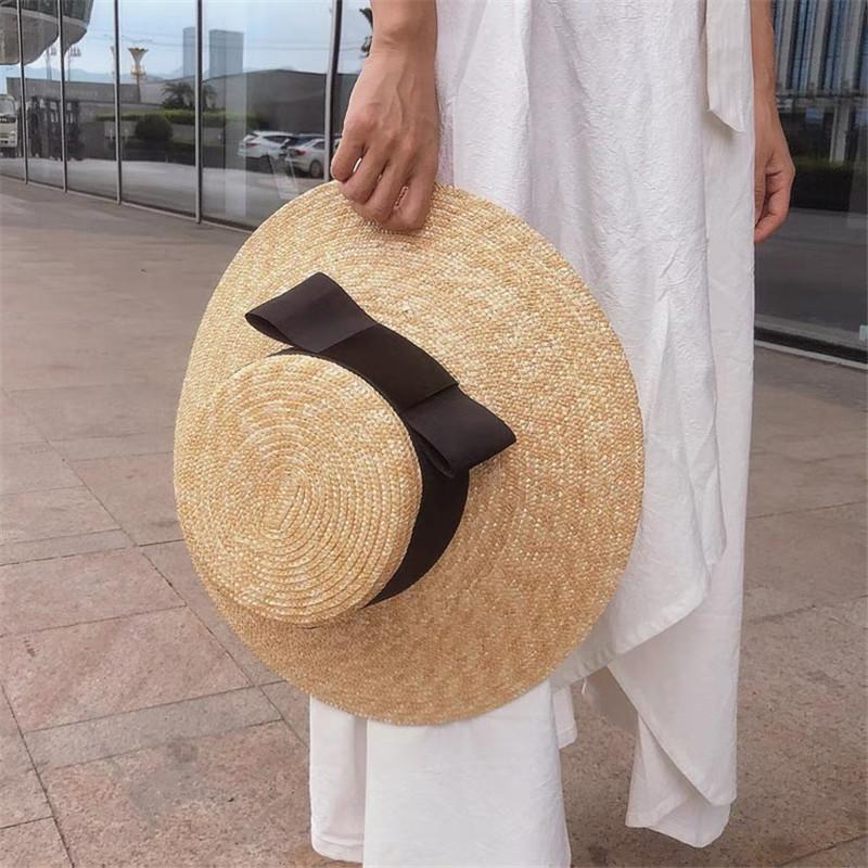 202507-nu ins chic summer handmade straw wide ribm big bowknot model show lady beach cap leisure sun hat sale