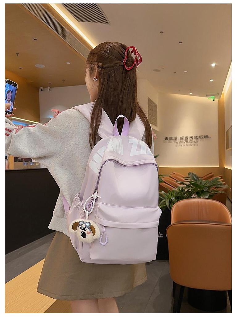 Versatile Letter Print Backpack for Students - Large Capacity for Junior High, High School, University, and Commuting.