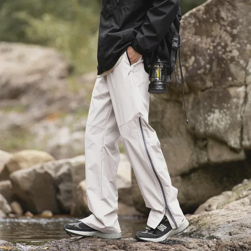 Unisexové rychleschnoucí větruodolné turistické kalhoty na jaro/podzim