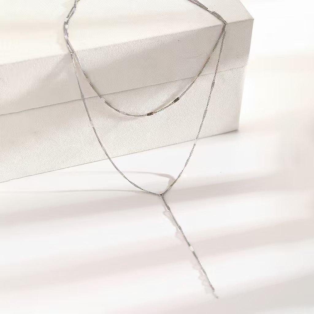 Stainless Steel Y-Shaped Tassel Necklace for Women - Double Layer Clavicle Chain with Fashionable and Elegant Design.