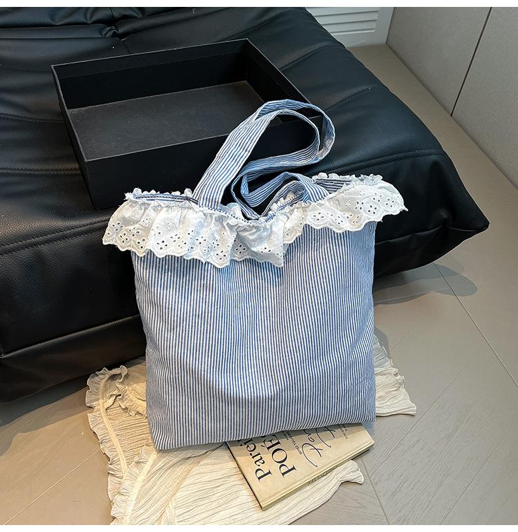 

Canvas bag women s 2025 new fashion versatile shoulder bag casual tote bag lace edge handbag
