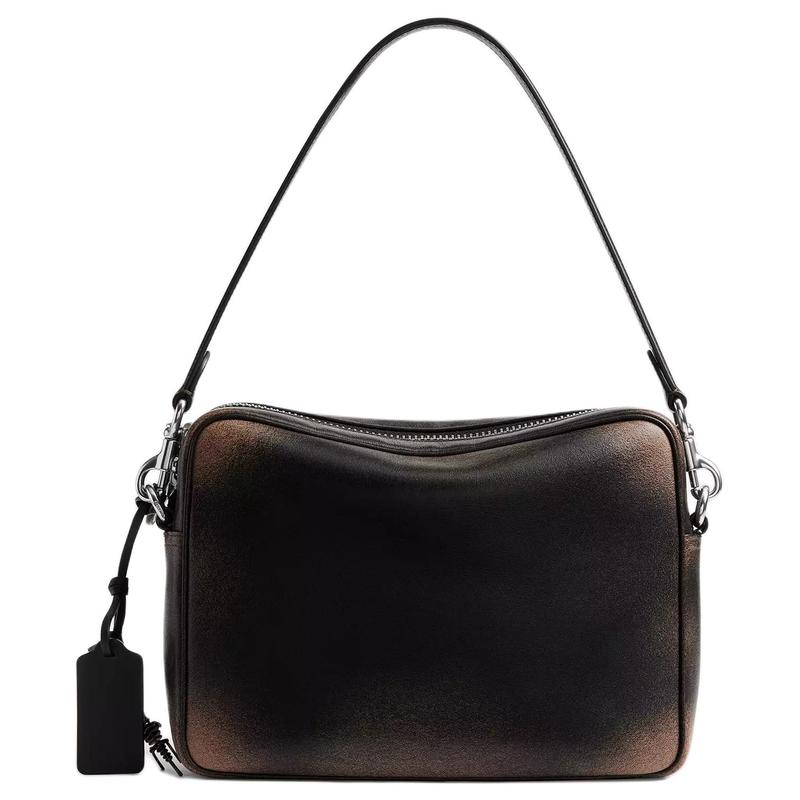 Coach Borsa a tracolla DAKOTACrossbody 24 chiusura a cerniera retrò tracolla staccabile design compatto ciondolo dinosauro pelle di mucca taglia media da uomo