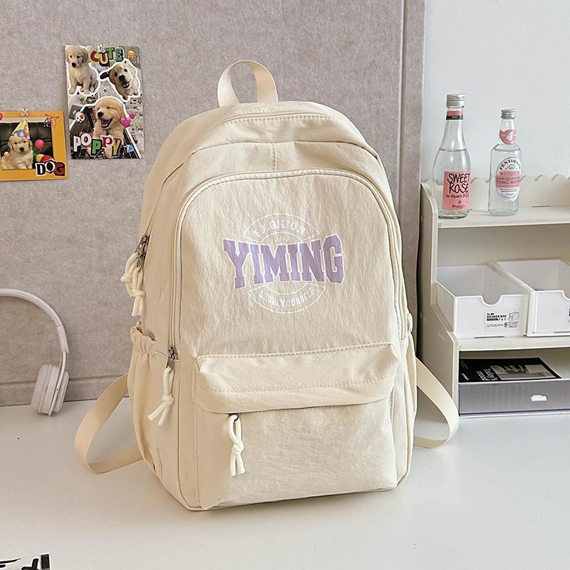 

New schoolbag junior high school girls high value college students simple solid color backpack women s leisure travel backpack