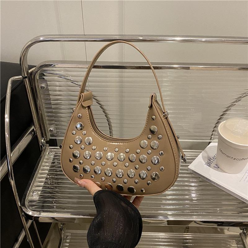 Einfache und modische neue Frühling-Achseltasche, Persönlichkeit, cool, mit Polka-Dot-Nieten, tragbare Knödel-Damentasche