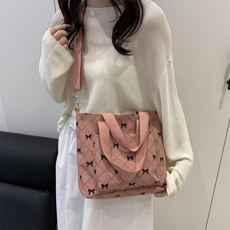 Sommer neue einfache und modische tragbare Tragetasche beliebte Mode Retro Pendler Schulter Umhängetasche