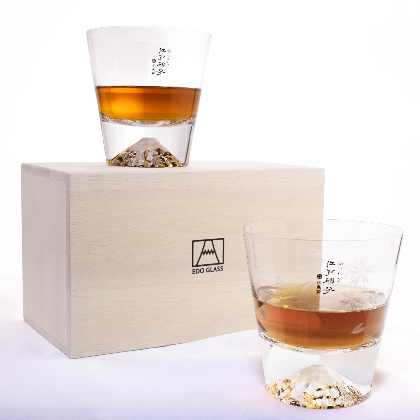 

Tajima Glass Handcrafted Mount Fuji Rocks Glasses in Sakura Kiriko Blossom Cut Wrapped in a Sakura Furoshiki Perfect for Respect for the Aged or