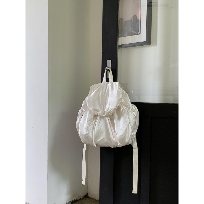Wrought silk backpack women's large-capacity flip drawstring leisure new backpack backpack women's high-end travel schoolbag