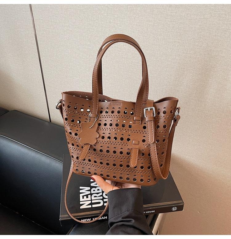 Popular small bag women's summer new versatile hollow messenger bag portable bucket bag