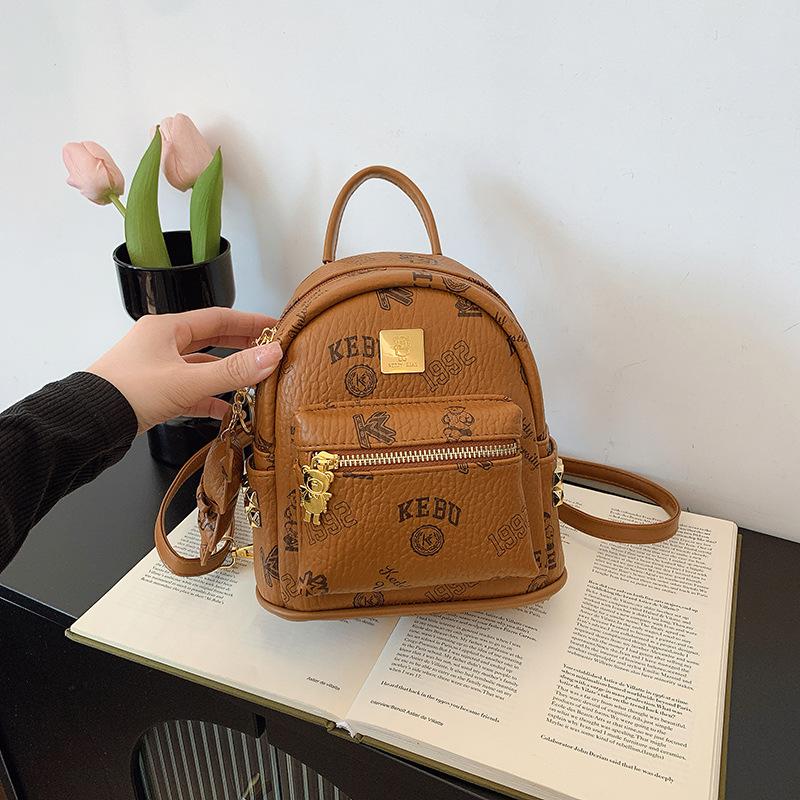 Mini Rucksacktasche Damen neue Mode Nischendesign Druck Ausgehen Pendeln Reisen kleiner Rucksack