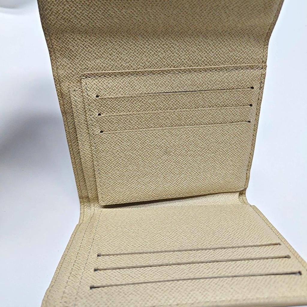 [Pre-Owned] White Coated Canvas Wallet - Good #1C3W7ZM