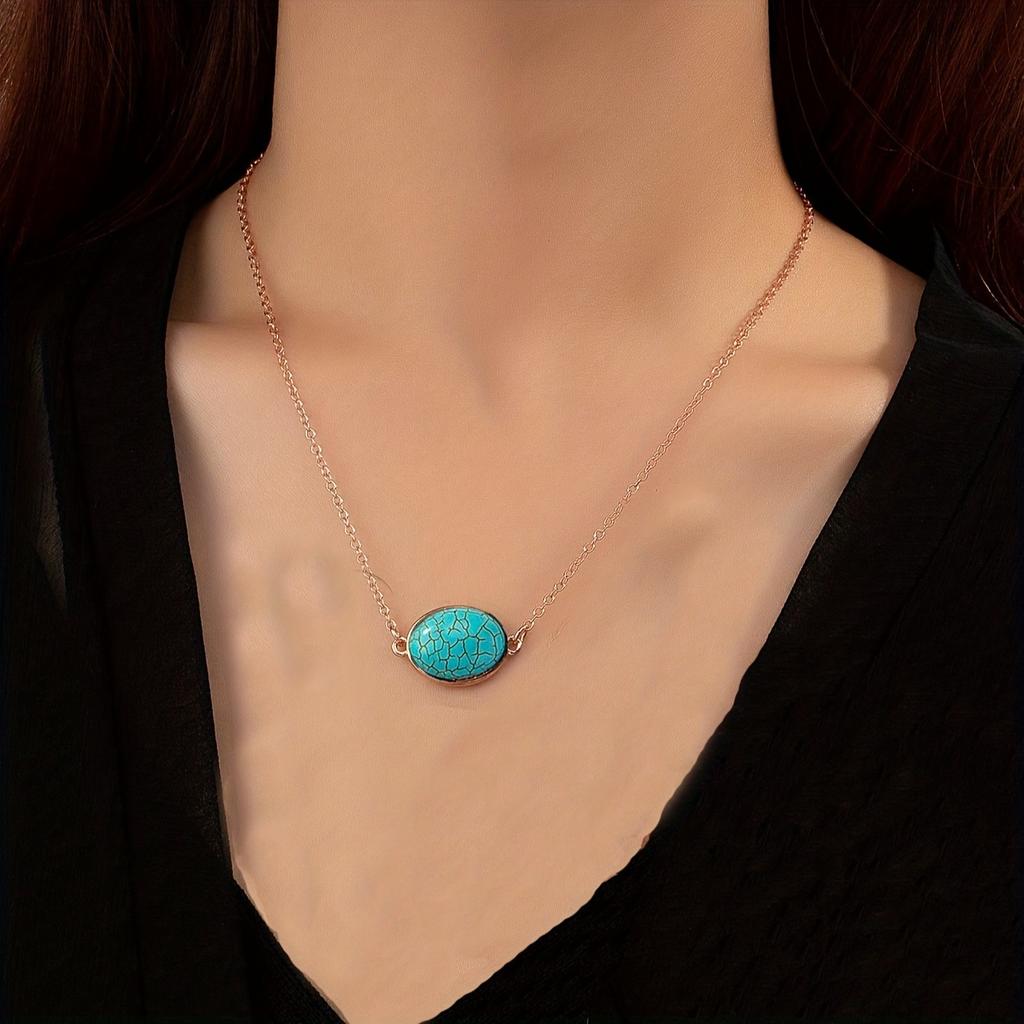 A golden yellow chain peacock blue explosion pattern stone pendant necklace collarbone chain fashionable and elegant vacation style