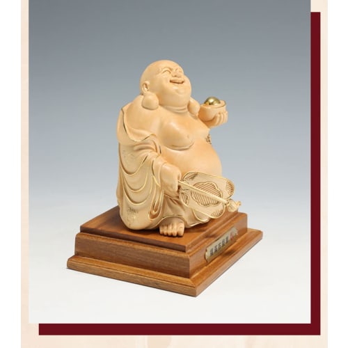 High-quality wooden carved Buddhist statue of Hotei made from cypress wood (15cm high x 11cm wide) - a good luck charm