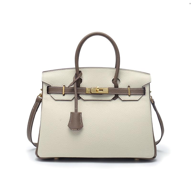 2021 Spring new trendy leather handbag top layer cowhide capacity one-shoulder crossbody hand-carried platinum bag