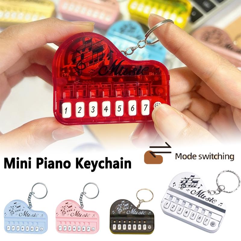 Bai Fen Bai Toys Battery Operated Mini Piano Keychain Portable Mini Keyboard Piano Fidget Toy 2 Modes 19 Songs Electronic Musical Instrument Toy