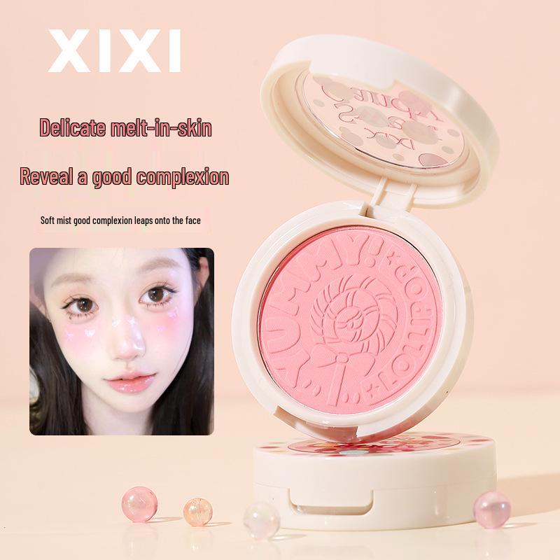 Xixi Sweet Pink Blush: Natural color payoff, brightens complexion, fine powder texture, enhances fairness, perfect for daily makeup.