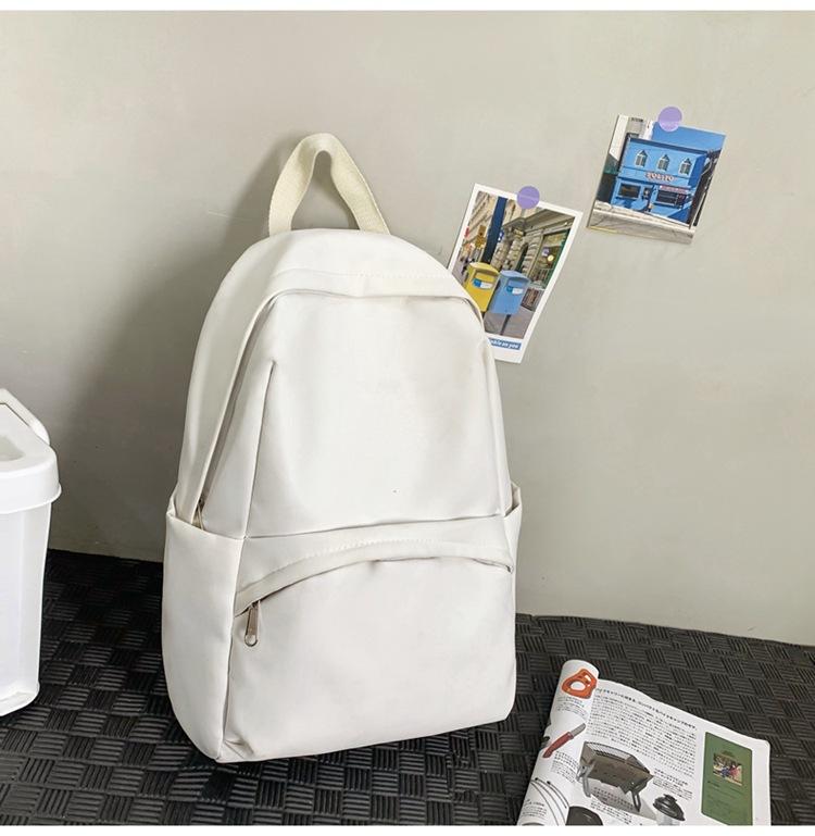School bag 2025 new solid color simple backpack college student Korean version school bag versatile simple casual fashion backpack