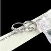 Entwined Love Zircon Ring: Elegant Design for Couples