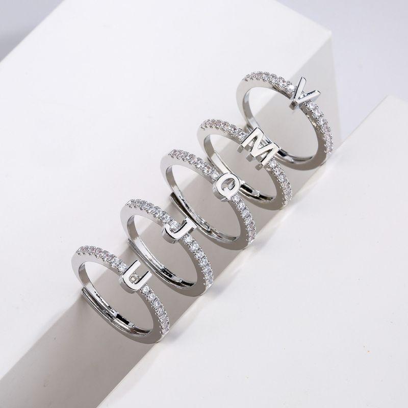 Hot Sale Europe and America Creative New Products Fashion Street Shooting Minimalist 26 English Letters Ring Opening Cross-Border Supply White Gold T