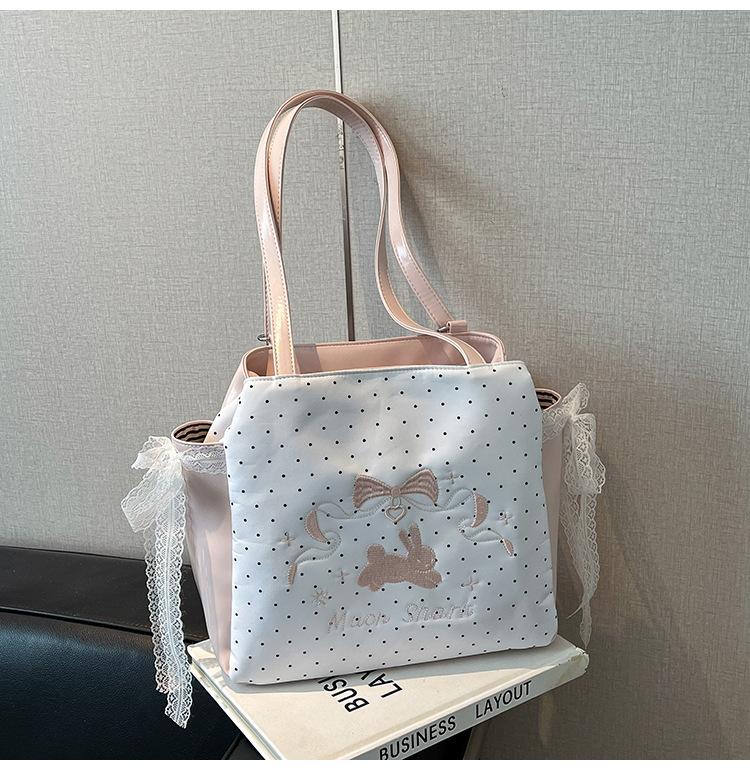 

Tote bag women s large-capacity new summer casual shoulder bag fashionable multi-functional backpack backpack рожевий