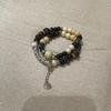 Keramikperlenarmband für Damen, Ethno- und Exotik-Stil, elastisches Seil, chinesisch inspiriertes Design