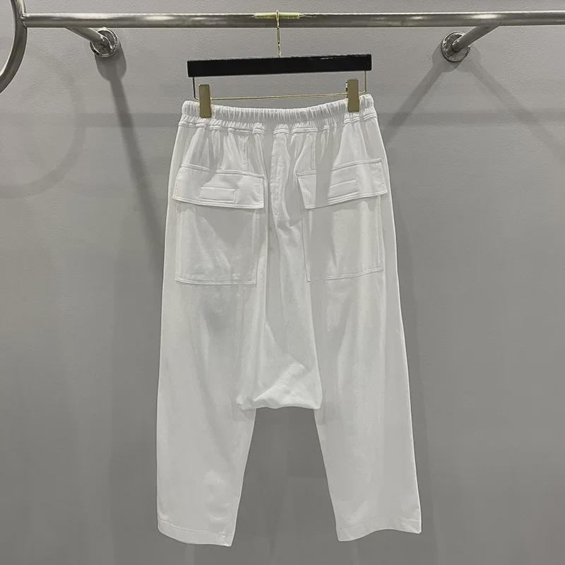 SUBHUMAN Pánská tmavá série: Slonově bílé zkrácené harémové pletené kalhoty - Letní ležérní móda