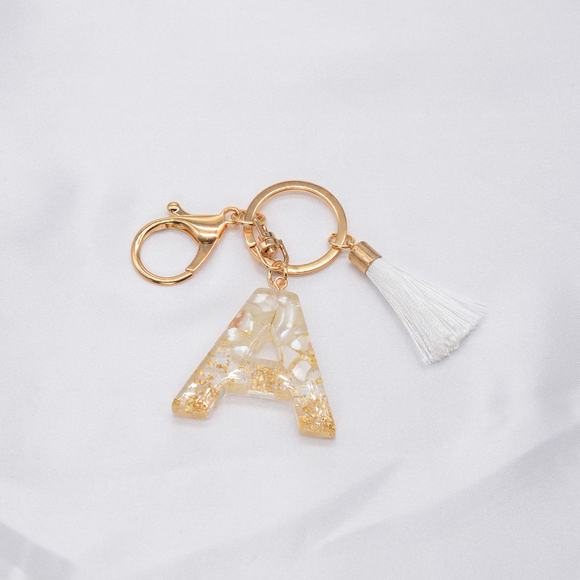 Gold Foil Tassel Keychain with English Letter Pendant