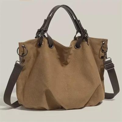 Japanese Retro Canvas Tote: Ladies Commuter Handbag, Lazy Style, Large Capacity, Perfect for Work or Student Use.