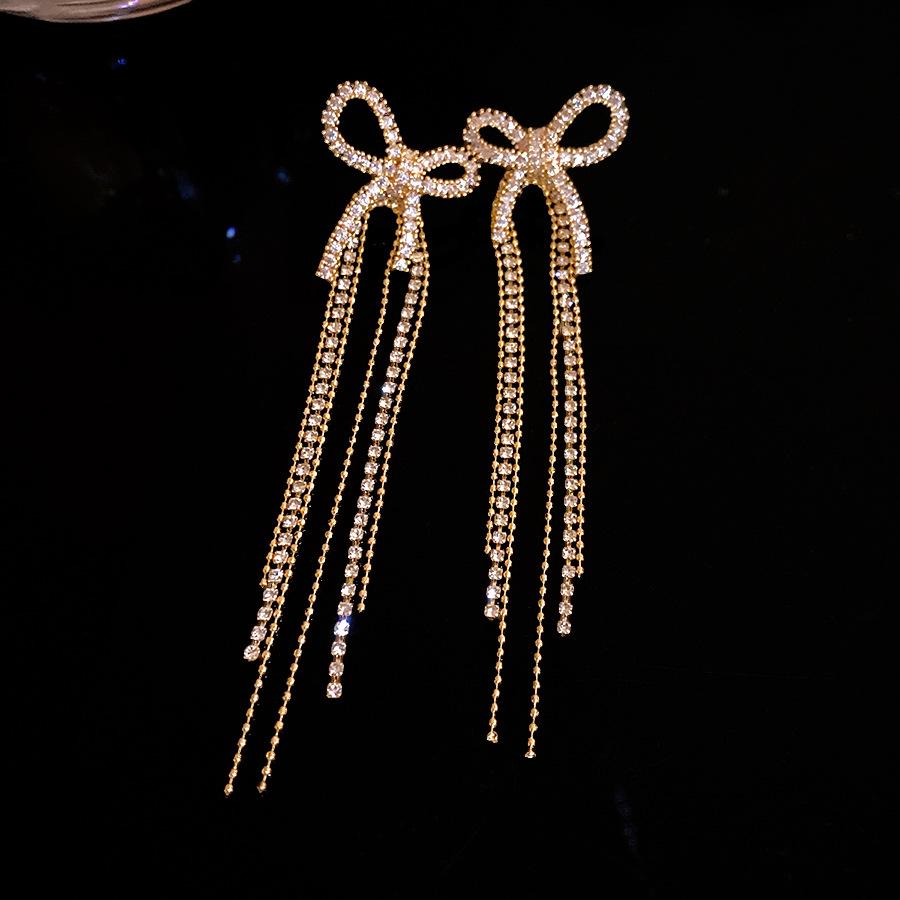 

Silver needle zircon bow fringed earrings retro elegant niche temperament earrings light luxury high-end earrings