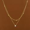 18 Karat Gold Doppellagige Halskette mit schlichtem Vierklauen-Zirkonia & Goldperle an Edelstahlkette