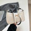 Fashion bow 2025 solid color new Korean version trendy texture foreign style commuting single shoulder underarm baguette bag women