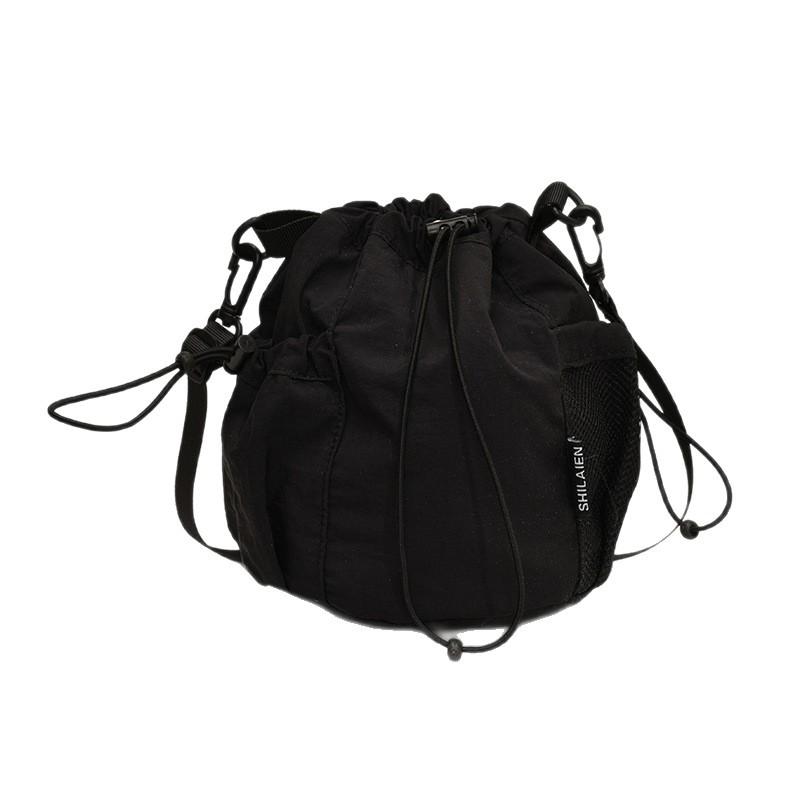 Niche Design Nylon Bucket Bag Women's 2026 Spring New Fashion Super Fire Drawstring Shoulder Messenger Bag