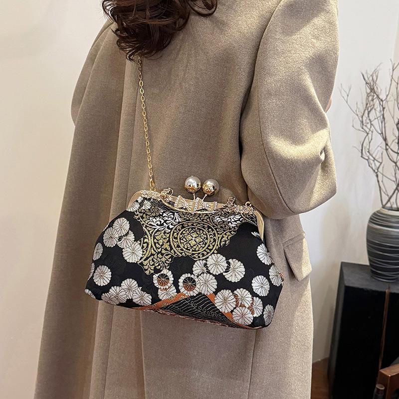 Borsa a tracolla messenger ricamata a colori contrastanti borsa moda donna design di nicchia di alta gamma borsa a mano a spalla singola