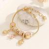 DIY Beaded Bracelet Making Kit with Sparkling Enamel Flower Charms and Metal Chain Accessories