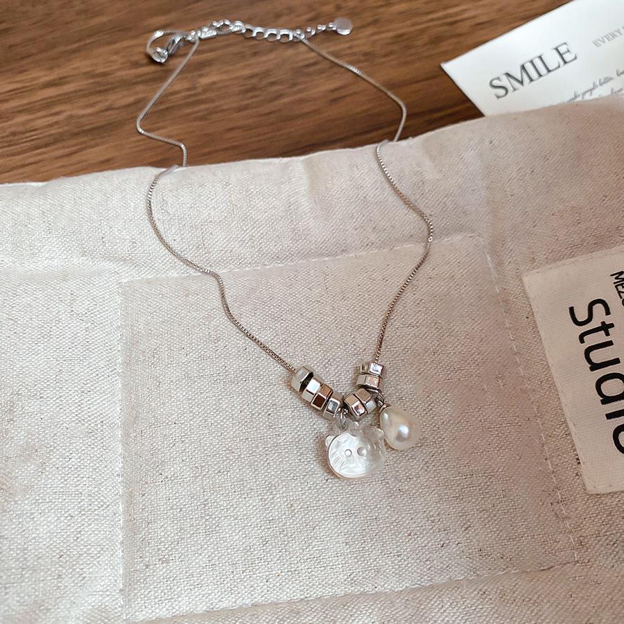 Retro Irregular Bow & Heart Tassel Necklace - Cool Versatile Clavicle Chain for Autumn & Winter