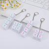 Versione coreana di Kawaii decompressione 4 tasti quadrati Macaron portachiavi pressione punta delle dita accessori creativi lettera giocattolo