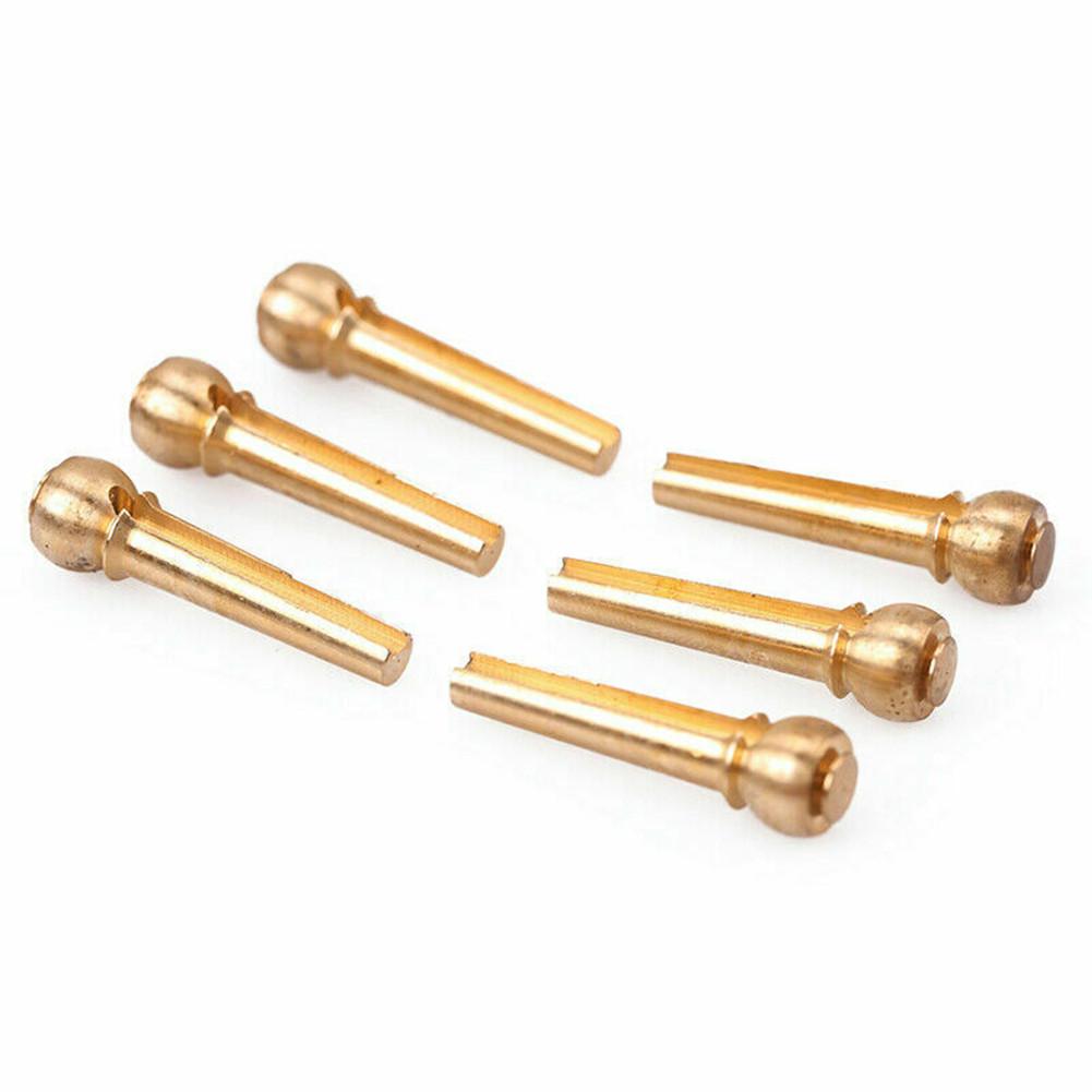 

6Pcs Guitar Strings Nail Metal Acoustic Guitar Bridge Pins Brass Fixed Cone Pins String nut Nails for Guitar Parts Replacement United States